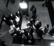 Photo of journalists gathering in the House of Commons foyer